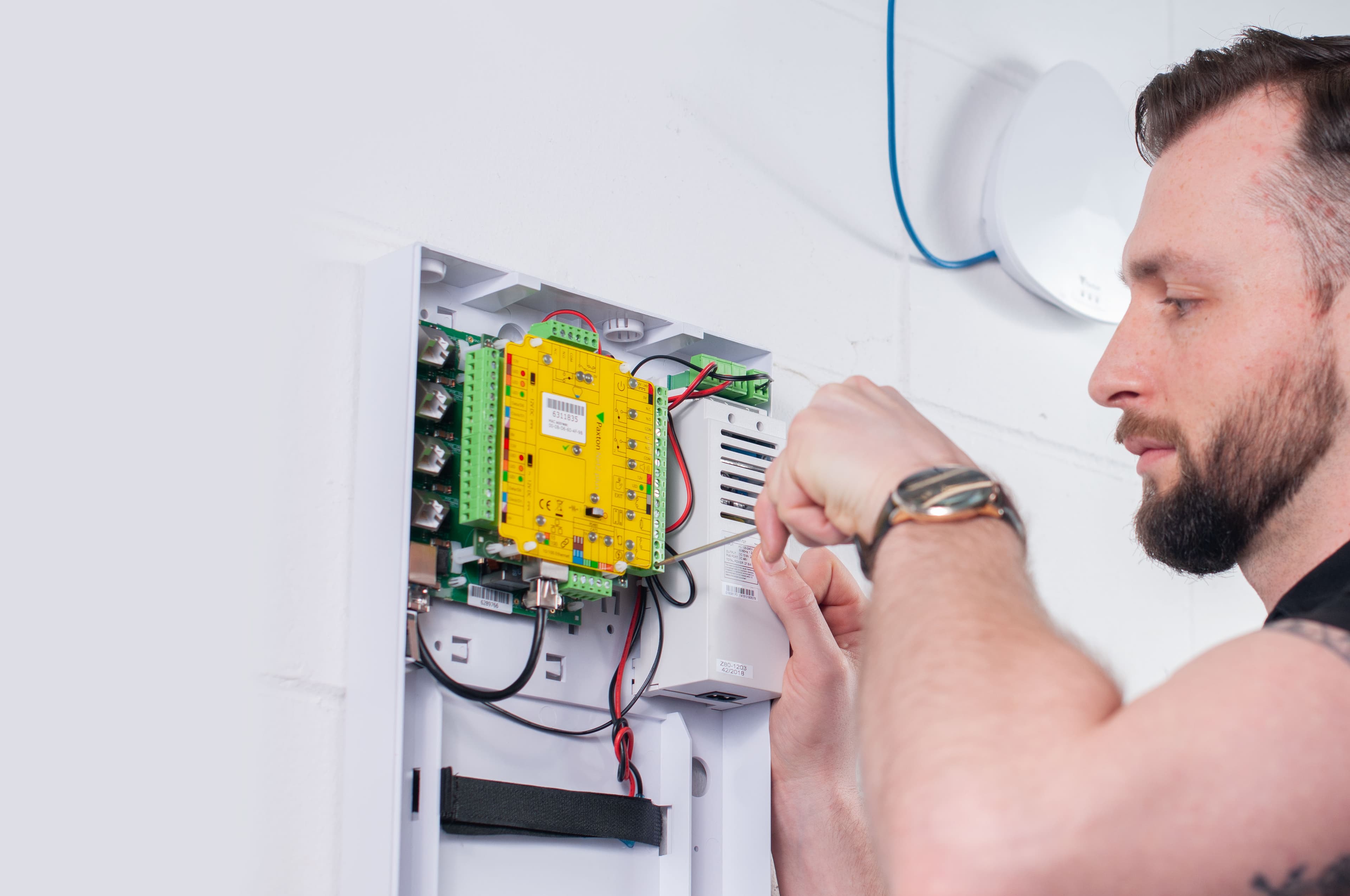 Paxton control unit being installed