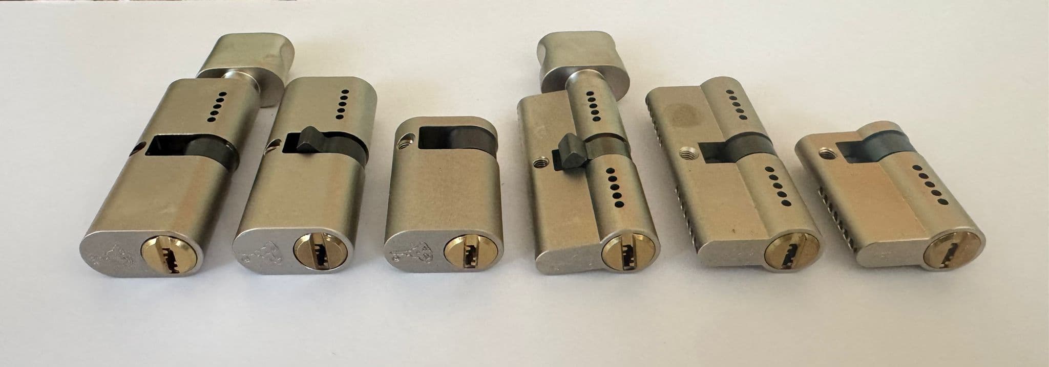 Row of lock cylinders for master keying